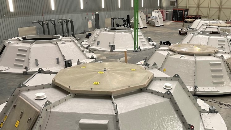 Monopile covers in factory, fot. Vattenfall
